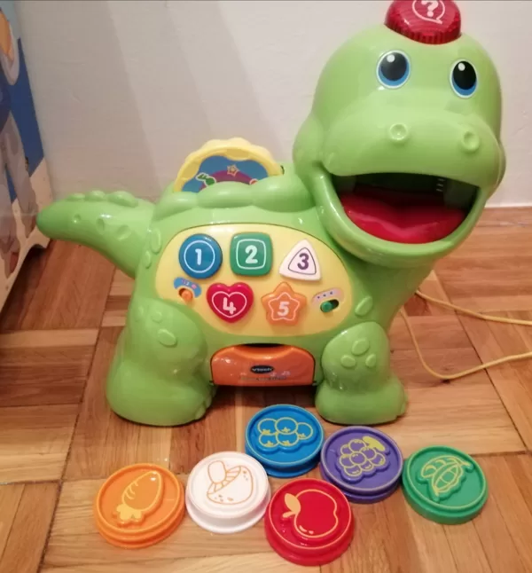 Vtech éneklő dínó, melyet meg lehet etetni a hozzá tartozó gyümölcsös korongokkal 5000ft 